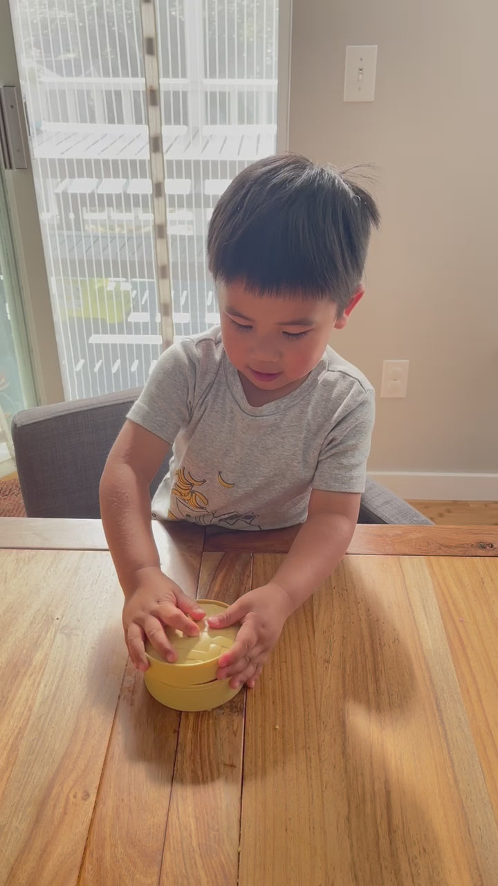 Video of kid playing with cute squishy bao stress relief fidget toy