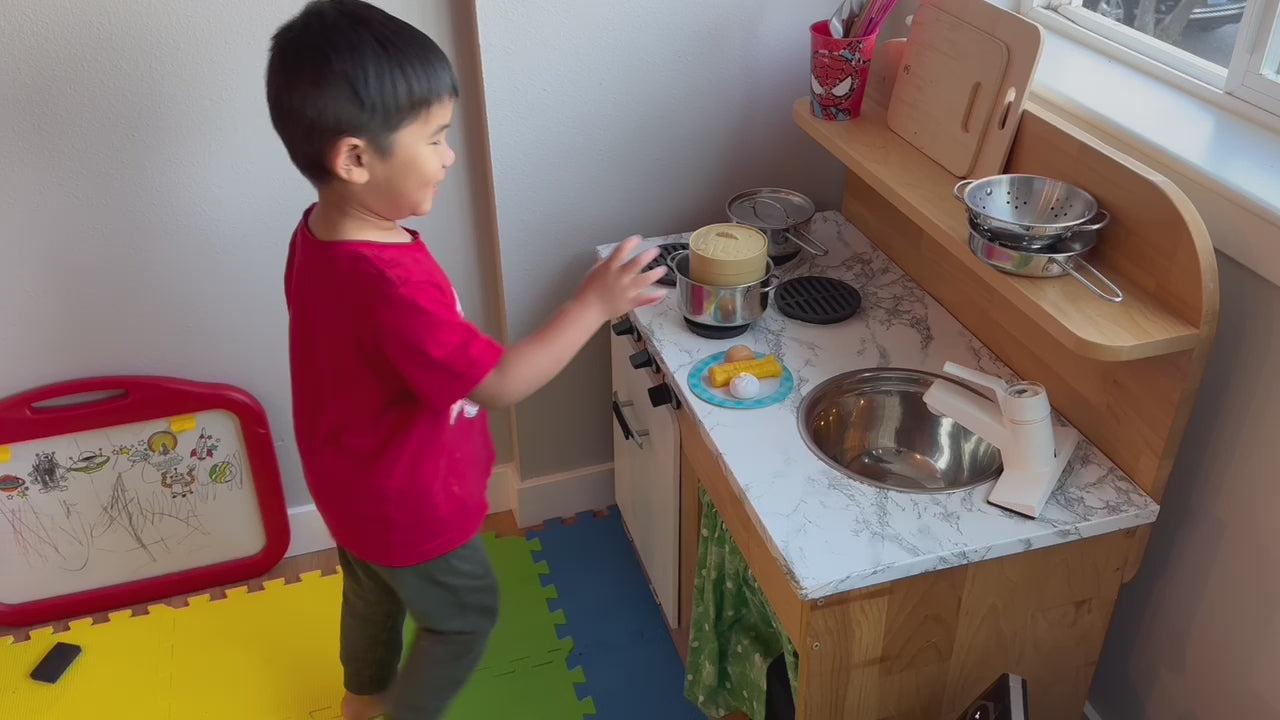 Video of kid playing with Chinese breakfast/dim sum toy set for cultural education